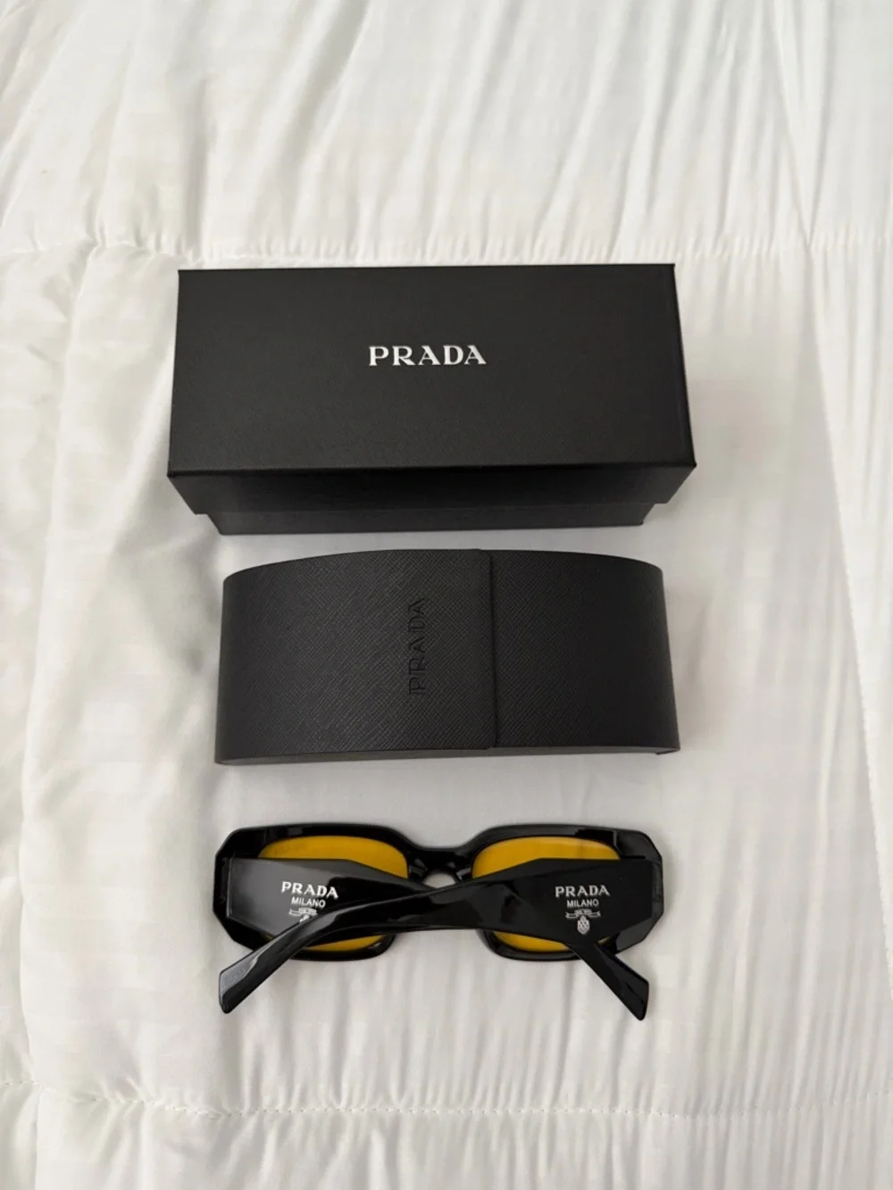 Prada Black Frame Sunglasses with Yellow Lenses - Picture 3 of 3